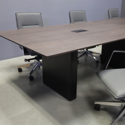 144-inch Aurora Rectangular Conference Table in 1/2-inch Gray oak engineered surface top, black matte laminate standard base, and 2 black MX3 power boxes.