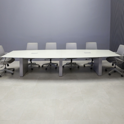 144-inch Omaha Boat Shape Conference Table in 1/2-inch taupe tempered glass top, standard column base in fog gray matte laminate base, and two silver MX3 silver power boxes.