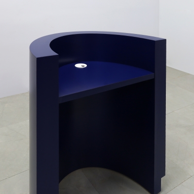 32-inch Lima Round Podium & Host Custom Desk in navy blue matte laminate main desk and toe-kick.