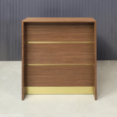 32-inch New Jersey Podium & Host Custom Reception Desk in walnut heights matte laminate main desk & front panels, and brushed gold accent & toe-kick.