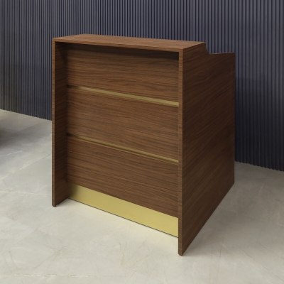 32-inch New Jersey Podium & Host Custom Reception Desk in walnut heights matte laminate main desk & front panels, and brushed gold accent & toe-kick.