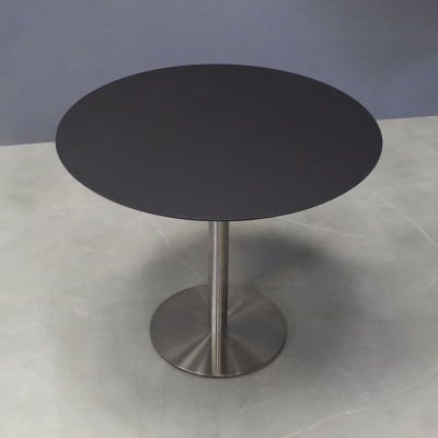 36-inch California Round Conference Table with 1/2-inch black traceless engineered surface top and silver stainless steel base.