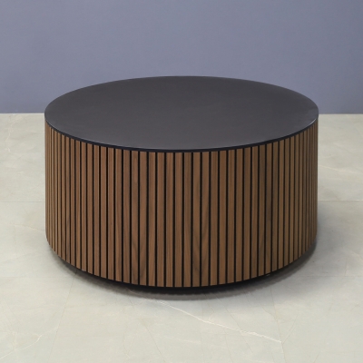 36-inch Norfolk Round Lobby Table in 1/2-inch black traceless engineered surface top, walnut tambour table, and black traceless laminate toe-kick.