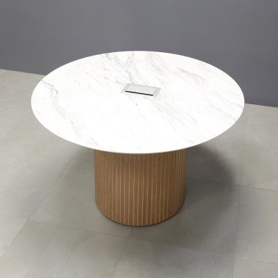 48-inch Aurora Round Conference Table in 1/2-inch calcutta blanc engineered surface top, white oak tambour base, and silver MX3 power box.