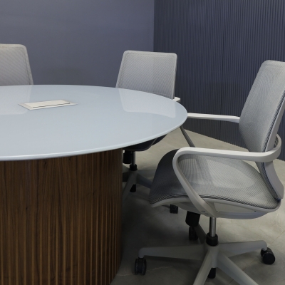 48-inch Omaha Round Conference Table in 1/2-inch in light gray tempered glass top with silver MX3 power box, and walnut veneer tambour base.