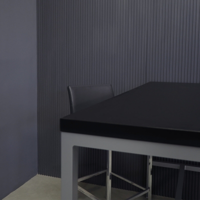60-inch Aspen Bar Table in black traceless laminate top, and gray metal frame.
