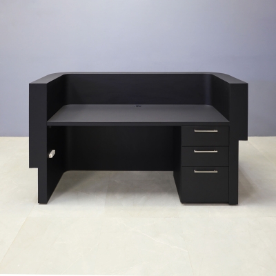 72-inch Nola Curved Custom Reception Desk in black traceless laminate counter, maple tambour bottom. Built-in storage on the right side when sitting.