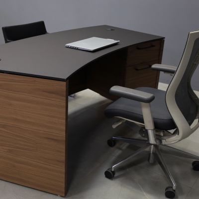  72-inch Seattle Curved Executive Desk in 1/2-inch Black traceless engineered surface top and walnut veneer base.