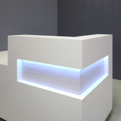 72-inch Manhattan ADA Compliant Custom Reception Desk in white matte laminate main desk, field elm matte laminate accent and brushed aluminum laminate toe-kick, with white LED shown here.