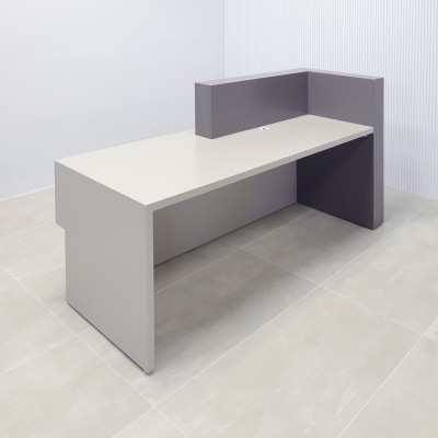84-inch Atlanta Custom Reception Desk with the countertop & base on the left side when facing front covered in storm gray matte laminate, while the workspace and front panel are covered in fog gray matte laminate.