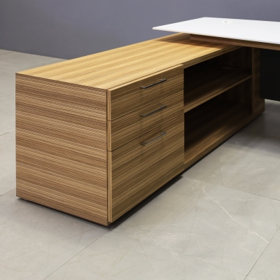 84-inch Avenue Curved Executive Desk with Credenza in 1/2-inch white solid engineered surface top, zebrawood veneer credenza & leg, and storm gray matte laminate privacy panel.
