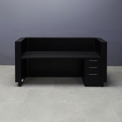 90-inch Nola Custom Reception Desk in black traceless laminate main desk, and brushed aluminum toe-kick. Built-in storage on the right side when sitting.