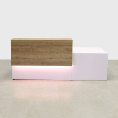 96-inch Los Angeles Long and ADA Compliant Custom Reception Desk with the counter on the left side when facing front in planked urban oak matte laminate, white matte laminate desk, and warm white LED.