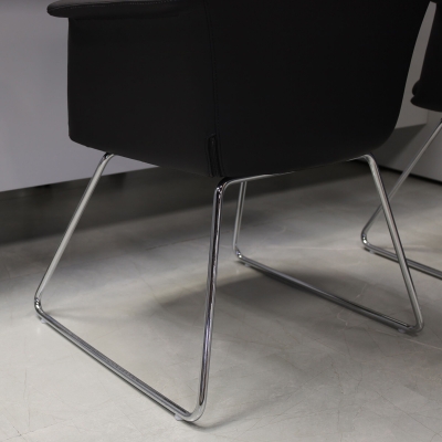 Archi Guest Chair in black upholstery, shown here.