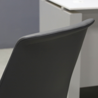 Archi Guest Chair in gray upholstery, shown here.