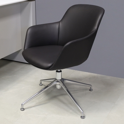 Pavia Guest Chair in black leatherette, shown here.
