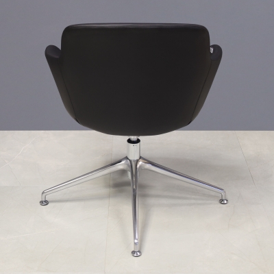 Pavia Guest Chair in black leatherette, shown here.