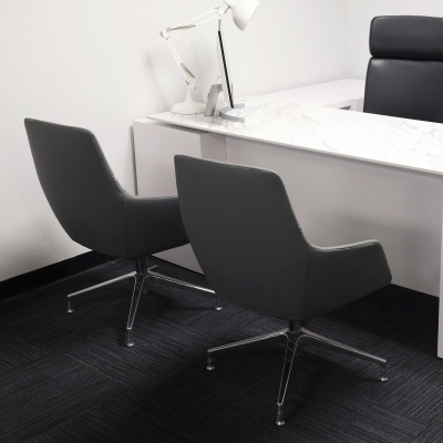 Silla Guest and Lobby Chair in gray leatherette, shown here.