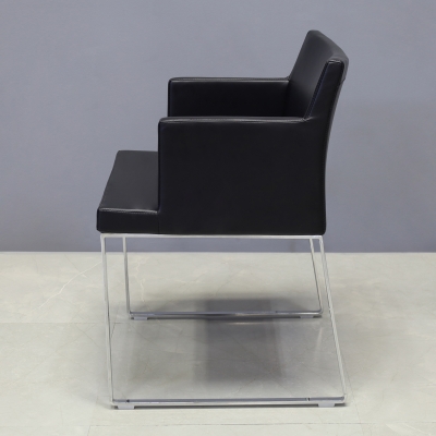 Soho Metal Armchair in Black Leatherette - Set of 2, shown here.
