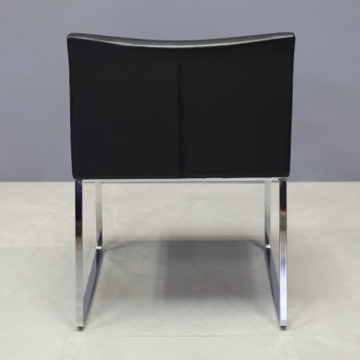 Soho Metal Armchair in Black Leatherette - Set of 2, shown here.