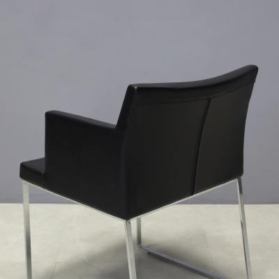 Soho Metal Armchair in Black Leatherette - Set of 2, shown here.