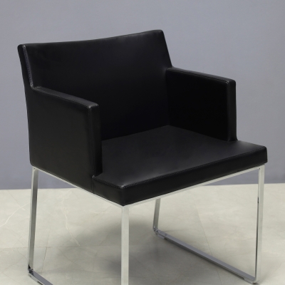 Soho Metal Armchair in Black Leatherette - Set of 2, shown here.