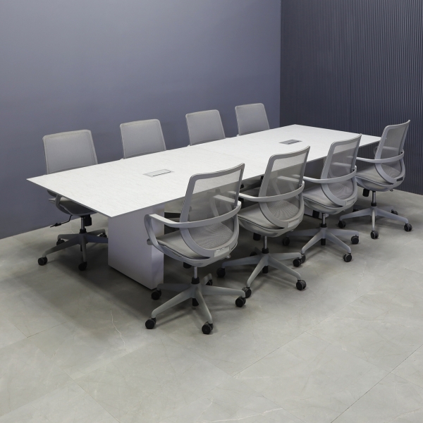 120-inch Aurora Rectangular Conference Table in 1/2-inch spanish limestone engineered surface top, dover off-white matte laminate standard base, and two silver MX3 power boxes.