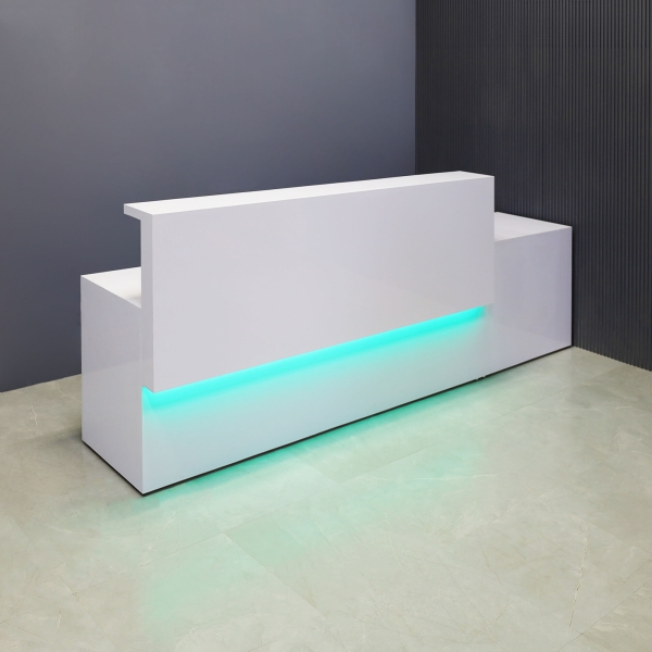 120-inch Los Angeles Long and ADA Compliant Custom Reception Desk with the counter on the left side when facing front & desk in white gloss laminate, and color changing LED.