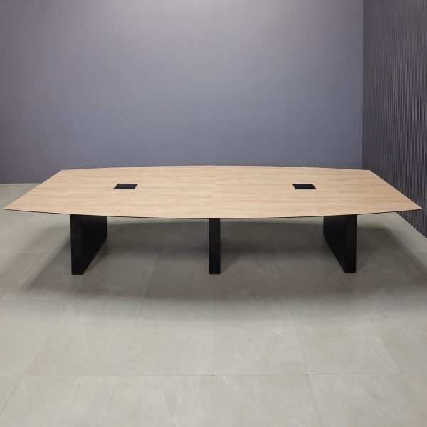 144-inch Aurora Boat Conference Table in 1/2-inch countryside oak engineered surface top, black matte laminate base, and two black MX3 power boxes.