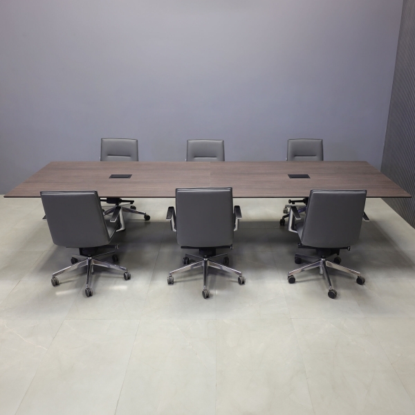 144-inch Aurora Rectangular Conference Table in 1/2-inch Gray oak engineered surface top, black matte laminate standard base, and 2 black MX3 power boxes.