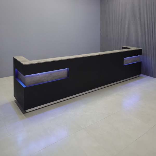 180-inch Manhattan Large U-Shape Custom Reception Desk in metropolitan concrete PVC counter top & accent panel, black traceless laminate main desk, brushed aluminum toe-kick, and color changing LED.