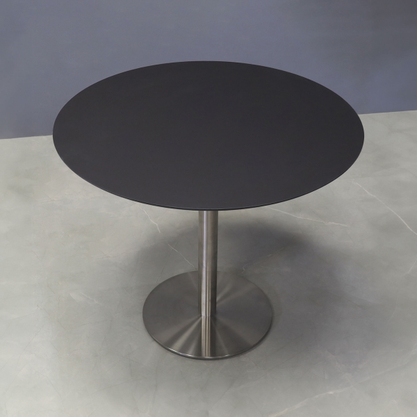 36-inch California Round Conference Table with 1/2-inch black traceless engineered surface top and silver stainless steel base.