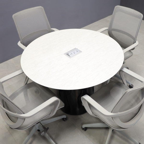 42-inch Aurora Round Conference Table in 1/2-inch spanish limestone engineered surface top, black gloss laminate base, and silver MX2 power box.