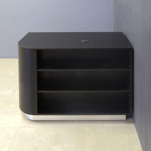 48-inch Nola Retail Custom Reception Desk in black matte laminate main desk with 2 adjustable shelves, and brushed aluminum toe-kick.