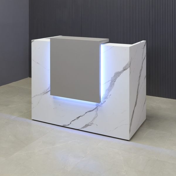 48-inch Chicago Custom Reception Desk in storm gray matte laminate counter and calcutta stone PVC desk, with color LED, shown here.