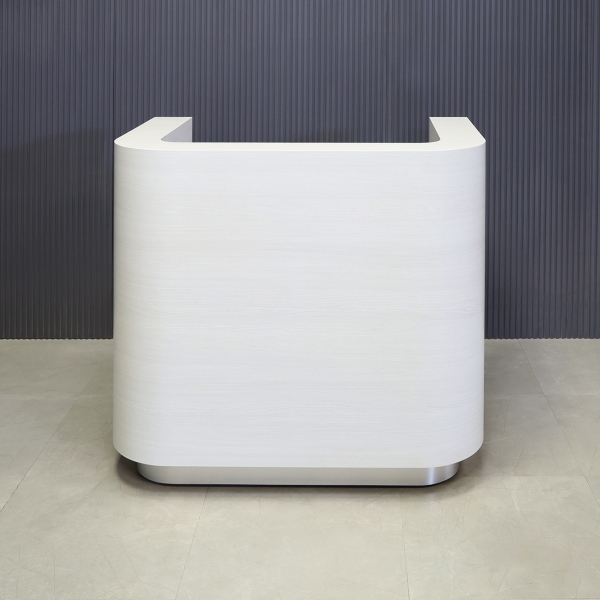 48-inch Nola Custom Reception Desk in white ash matte laminate main desk and brushed aluminum toe-kick.