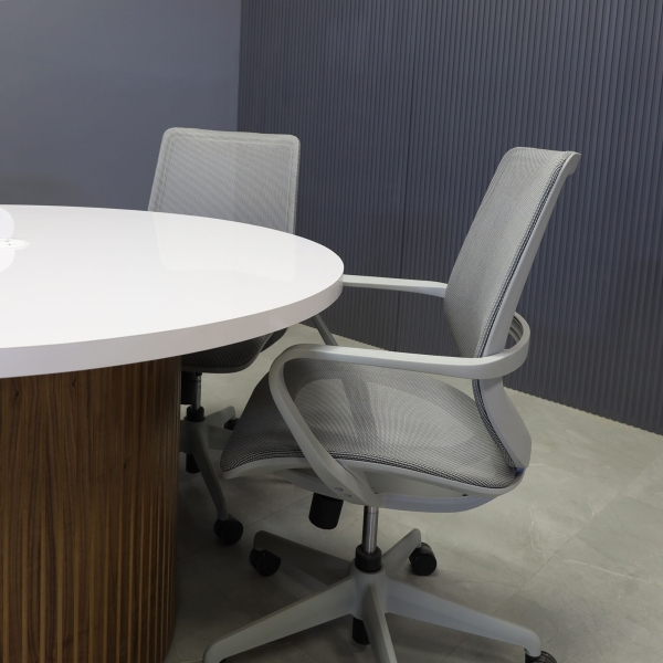 48-inch Newton Round Conference Table in white gloss laminate top, walnut tambour base, and white MX1 power box.