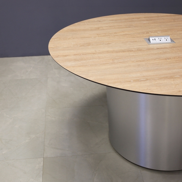 54-inch Aurora Round Conference Table in 1/2-inch Countryside oak engineered surface top, brushed aluminum base, and one silver MX2 power box.