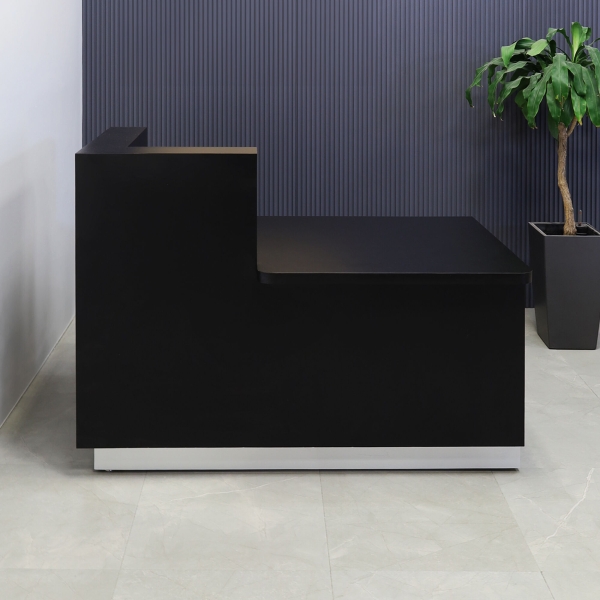60-inch Dallas ADA Compliant Counter Custom Reception Desk, l-shape counter & desk on the left side when facing front in black matte laminate & workspace, and brushed aluminum toe-kick.