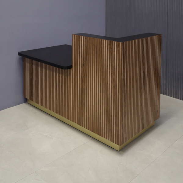 60-inch Dallas ADA Compliant Counter Custom Reception Desk, l-shape counter & desk on the right side when facing front in walnut tambour, black matte laminate workspace, and gold aluminum toe-kick, shown here.