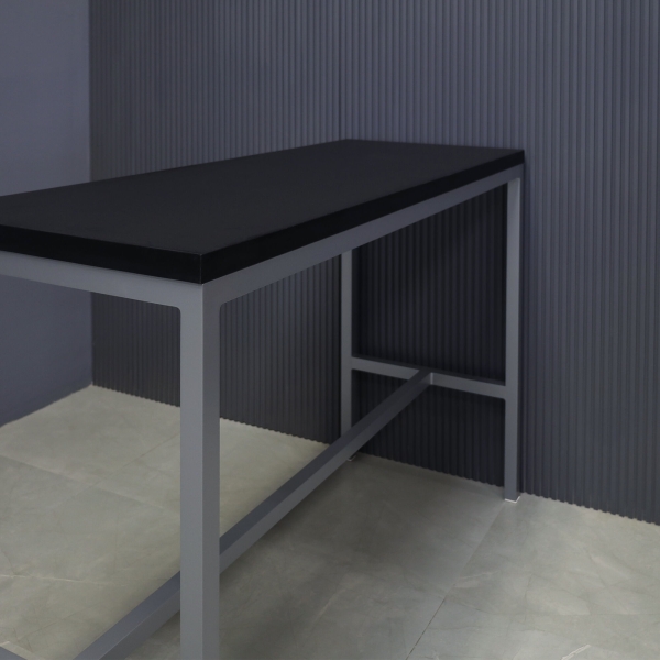 60-inch Aspen Bar Table in black traceless laminate top, and gray metal frame.