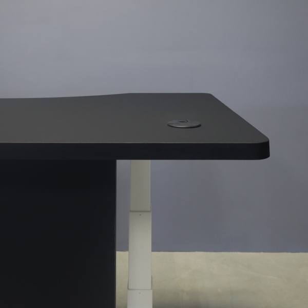 60-inch aXis Sit-stand Executive Desk with black traceless laminate top & privacy panel, and white metal legs, shown here.