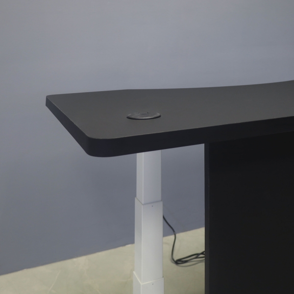 60-inch aXis Sit-stand Executive Desk with black traceless laminate top & privacy panel, and white metal legs, shown here.