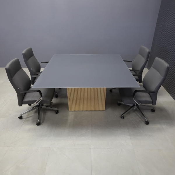 60-inch Omaha Square Conference Table in 1/2-inch dark gray tempered glass top, and maple tambour base.