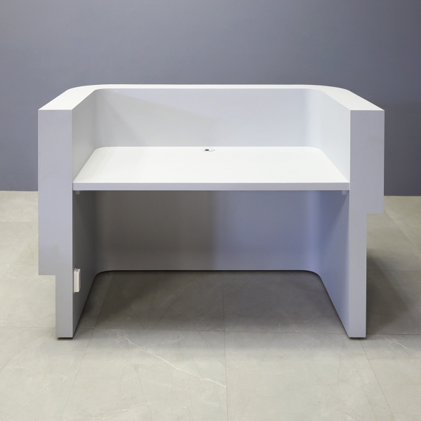 60-inch Nola Curved Reception Desk in folkstone gray matte laminate counter & inside desk, white tambour outside desk, and warm white LED.