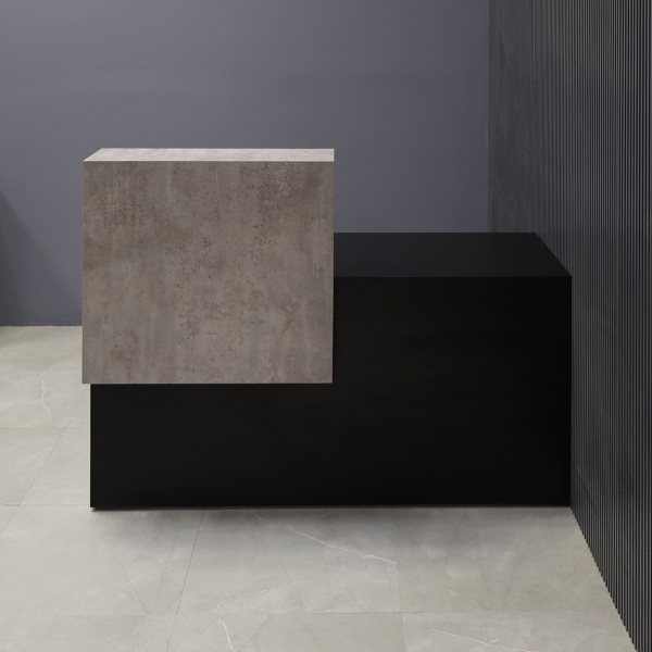 60-inch Los Angeles Custom Reception Desk with the counter on the left side when facing front in industrial concrete, and black traceless laminate desk, shown here.