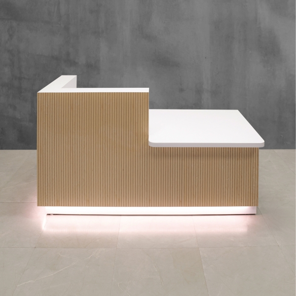 60-inch Dallas ADA Compliant Counter Custom Reception Desk, l-shape counter & desk on the right side when facing front in maple tambour, white matte laminate workspace, brushed aluminum toe-kick, and warm white LED.