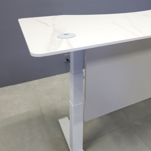 60-inch aXis Sit-stand Executive Desk in 1/2-inch solenne marble engineered surface top, folkstone matte laminate privacy panel and white metal base finish.