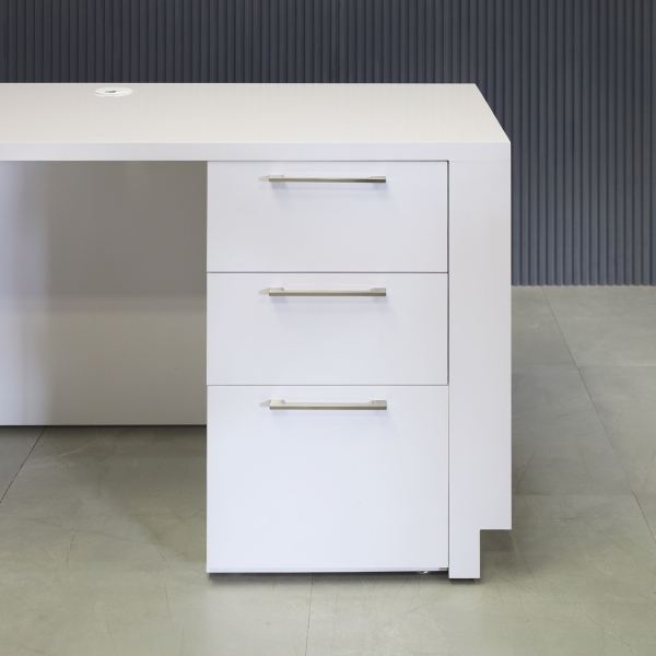 60-inch Houston Retail Custom Reception Desk in white gloss laminate main desk and brushed aluminum toe-kick. Built-in storage on the right side when sitting.