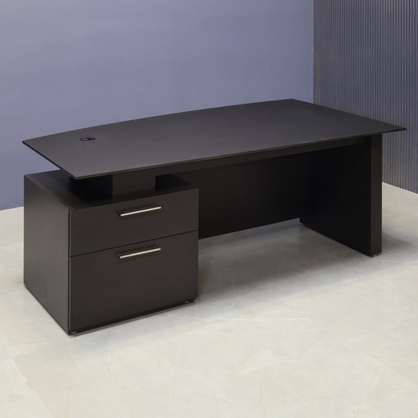 72-inch Avenue Curved Executive Desk in 1/2-inch black traceless engineered surface top, and graphite matte laminate base, storage & privacy panel.